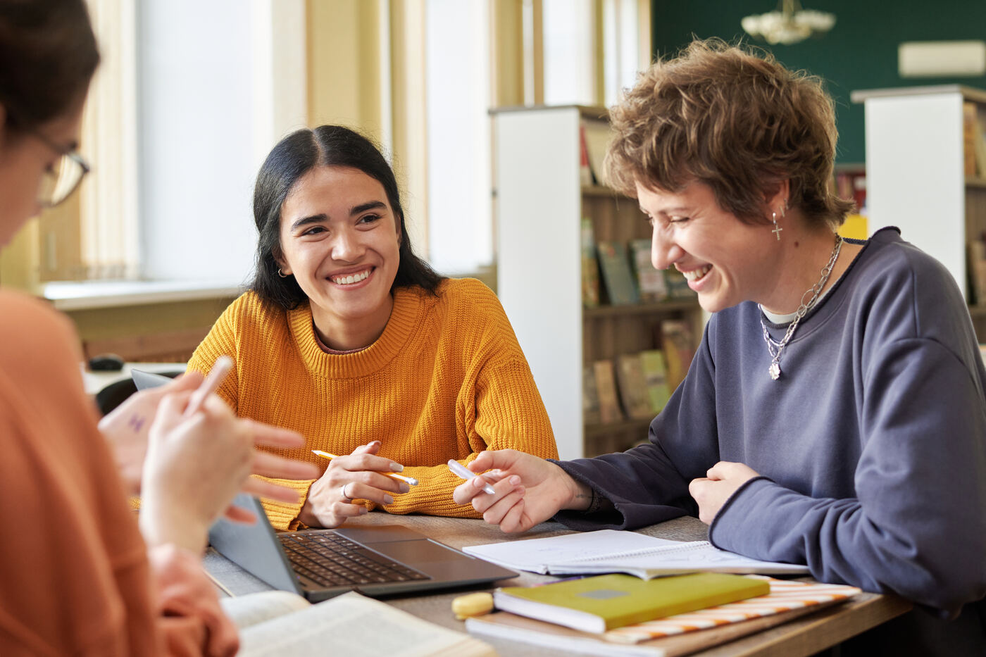 Student coaching session in the library